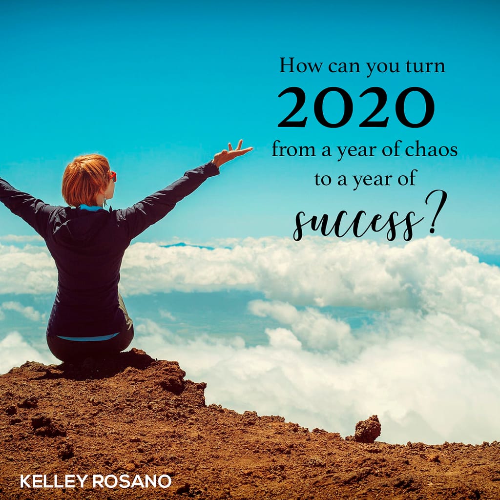 Person on cliff above clouds beside 2020 text