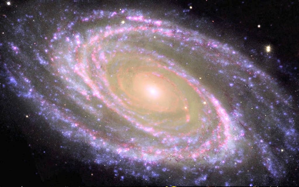 Colorful spiral galaxy with glowing central bulge