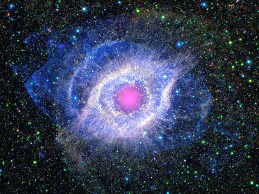 Eye-like nebula with glowing pink core