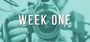 Close-up camera lens with "Week One" text
