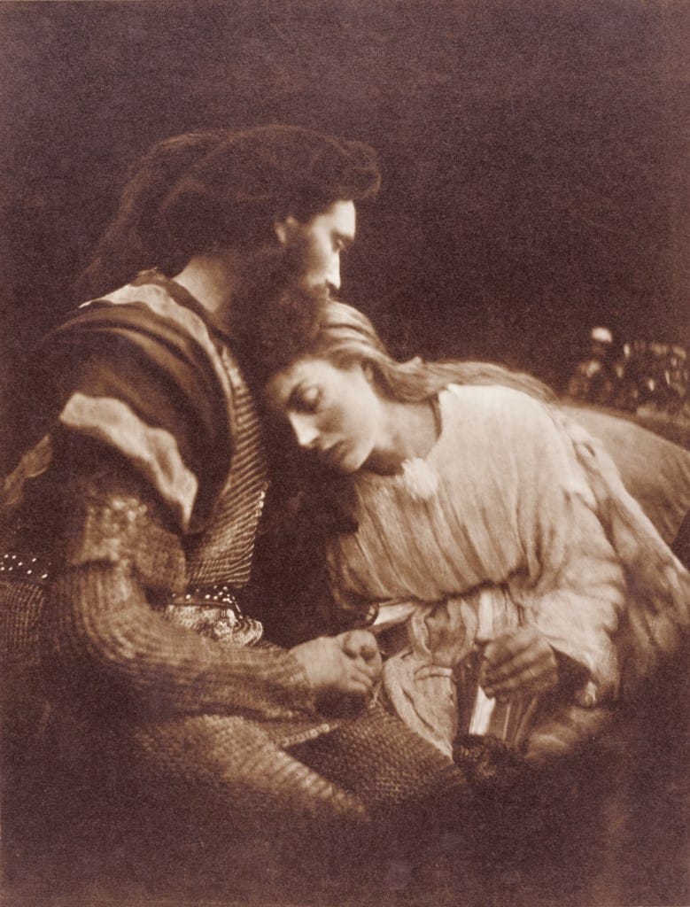 Sepia-toned knight comforting woman resting on shoulder