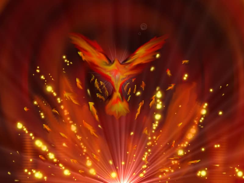 Fiery phoenix rising amid glowing sparks