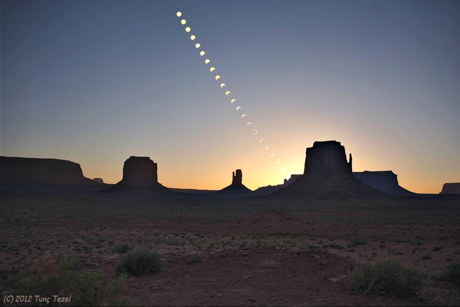 Solar eclipse progression over Monument Valley buttes